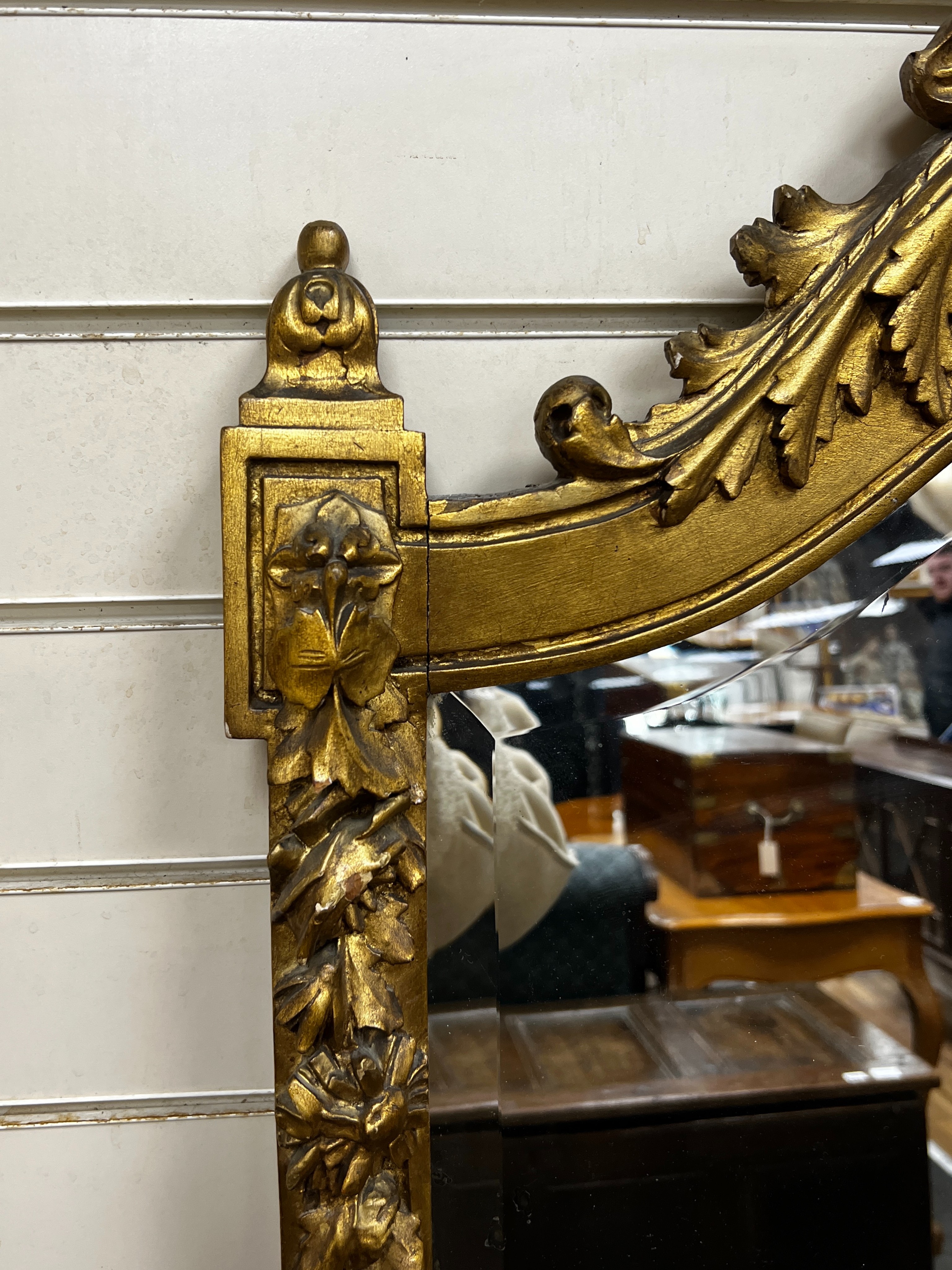 A Victorian carved giltwood and composition pier glass, width 106cm, height 167cm